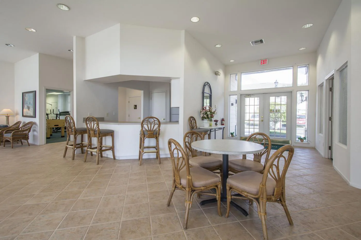 Tables and seating inside the community clubhouse